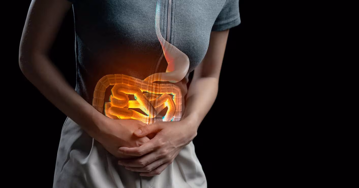 Abdominal pain woman, photo of large intestine on woman body, stomachache diarrhea symptom, menstrual period cramp or food poisoning. Health care concept. Abdominal pain woman, photo of large intestine on woman body, stomachache diarrhea symptom, menstrual period cramp or food poisoning. Health care concept.